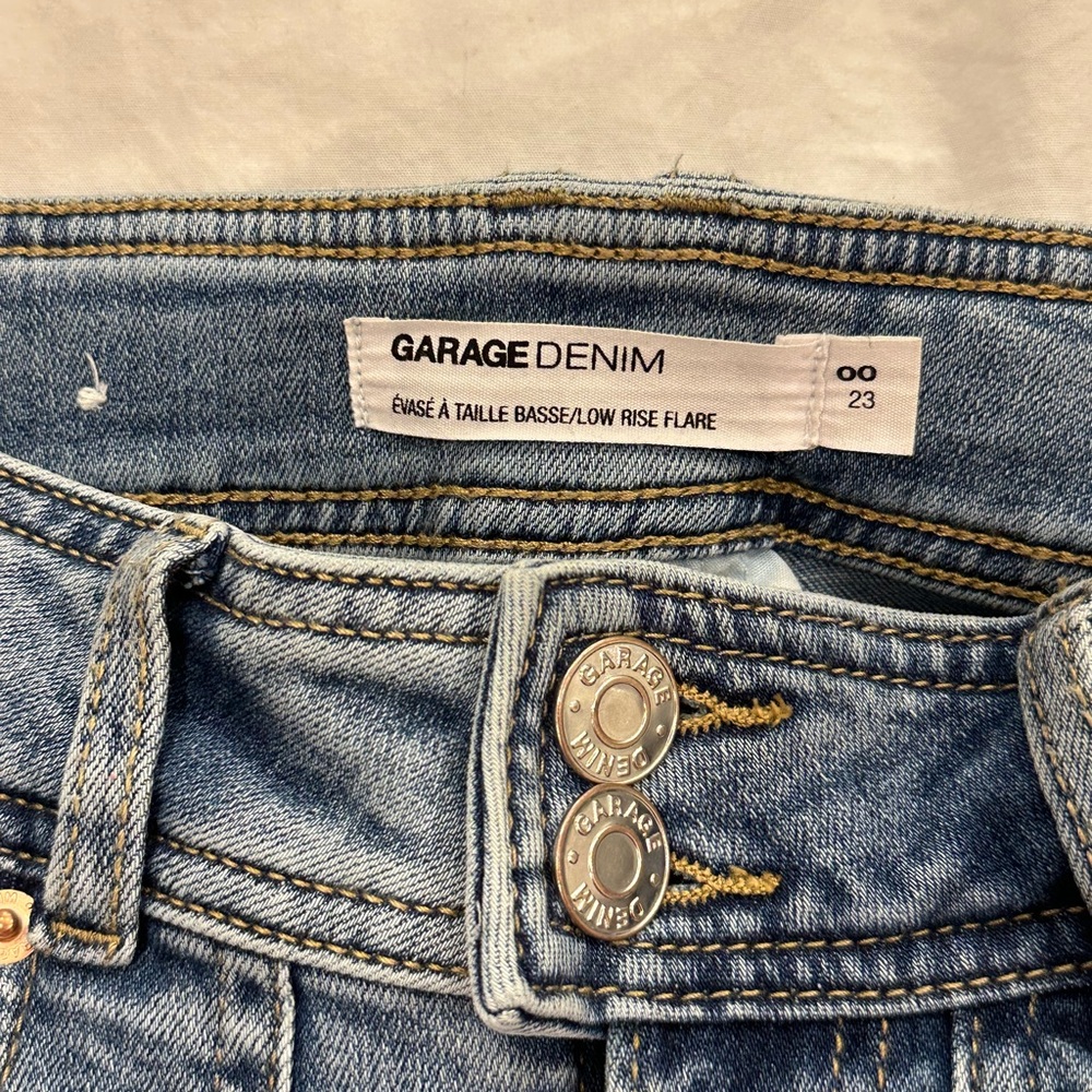 Garage low rise, flared jeans